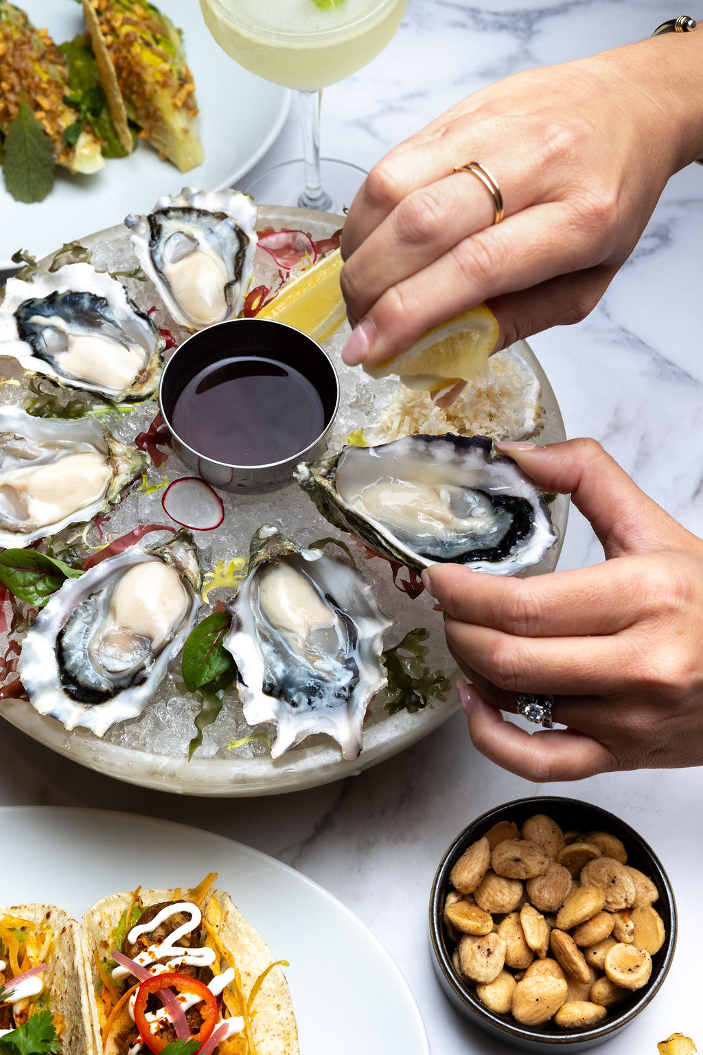 Oyster happy hour deal in Vancouver, BC at top seafood restaurant Boulevard Kitchen and Oyster Bar
